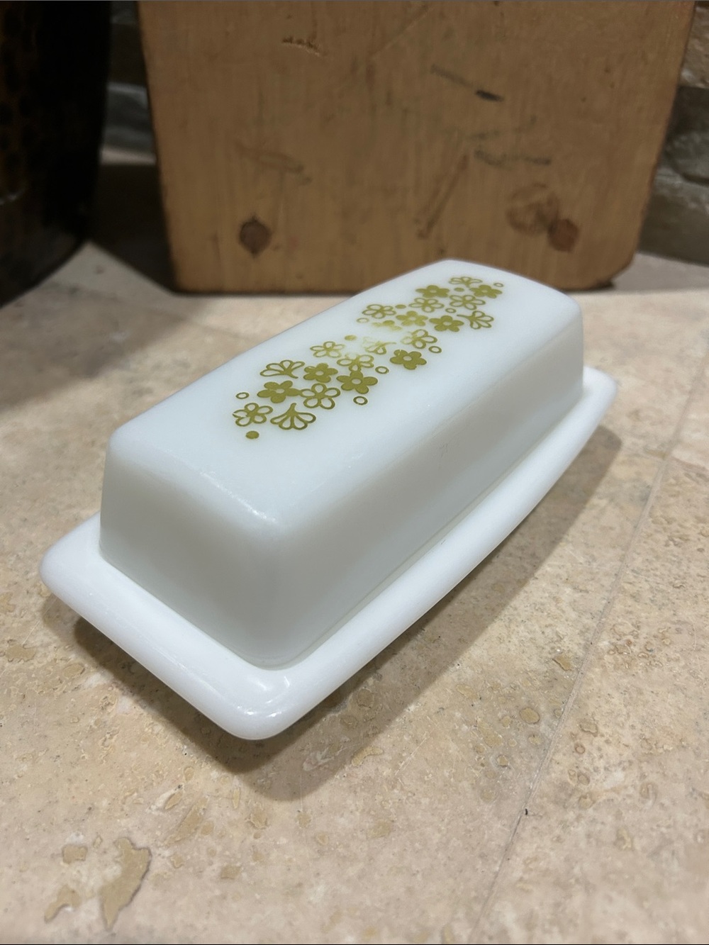 vintage PYREX Spring Blossom Green butter dish in the “Crazy Daisy" pattern